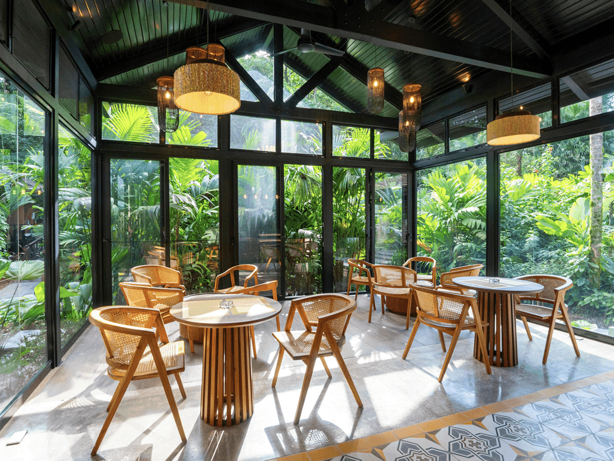 Dining room with glass windows at Hotel Rio Celeste, Costa Rica