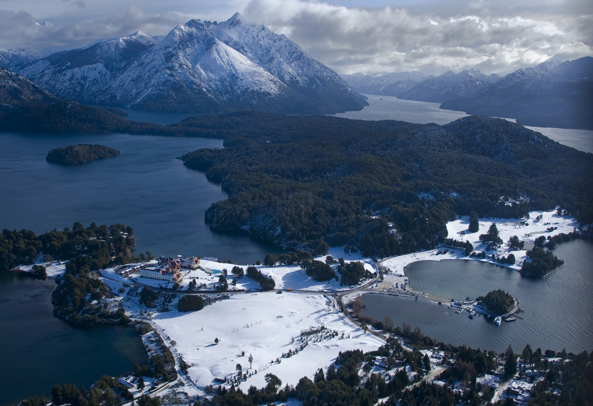 Aerial view of Llao Llao Resort, Argentina surrounded by snowy mountains and lakes