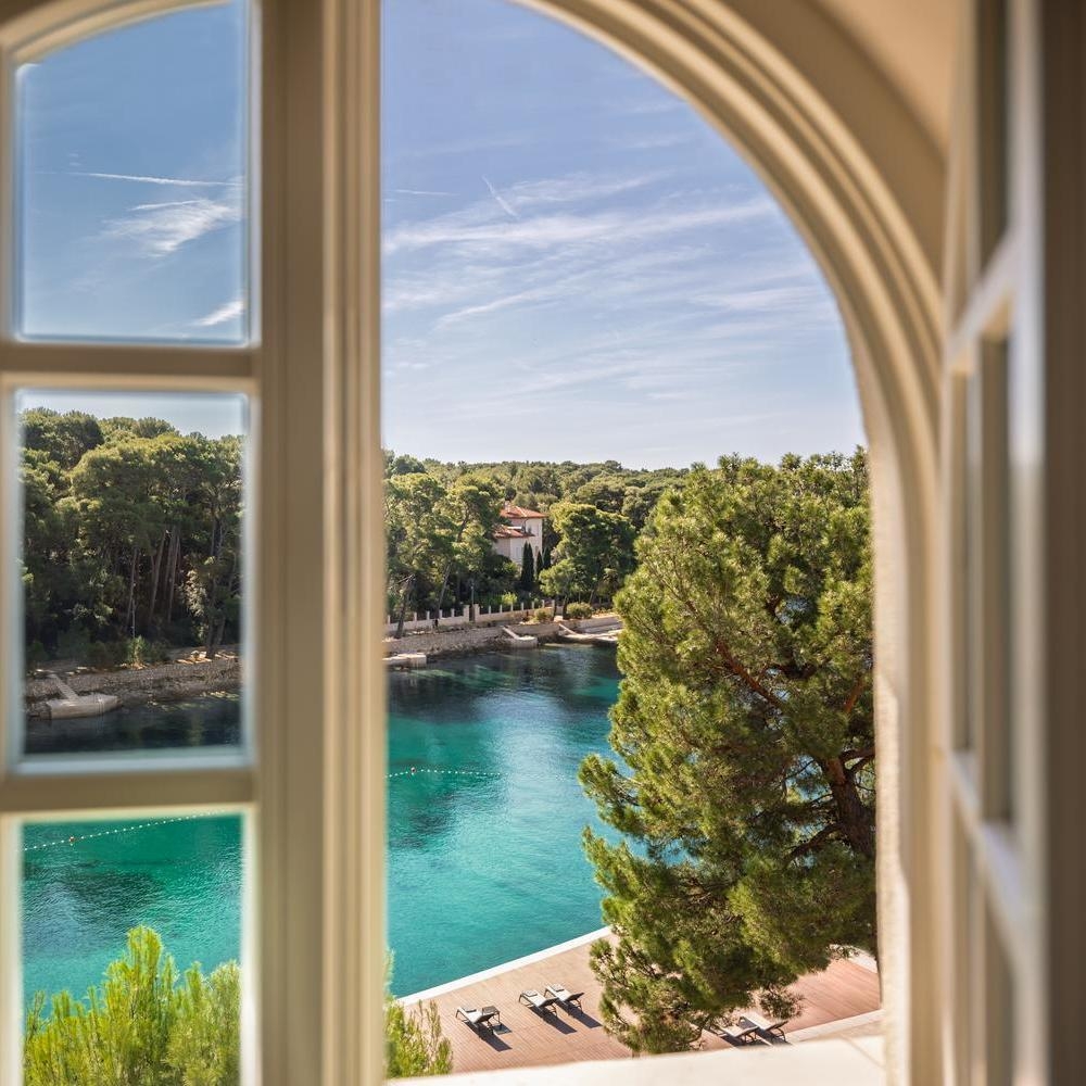 View onto the sea through a window at Boutique Hotel Alhambra in Croatia