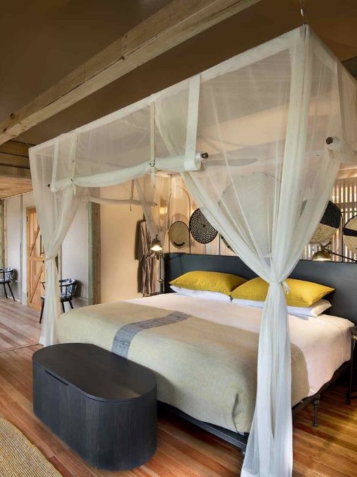 Canopy bed with mosquito netting