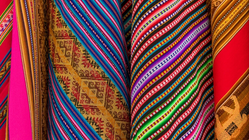 Colorful Bolivian textiles on a local art and craft market in La Paz, Bolivia,