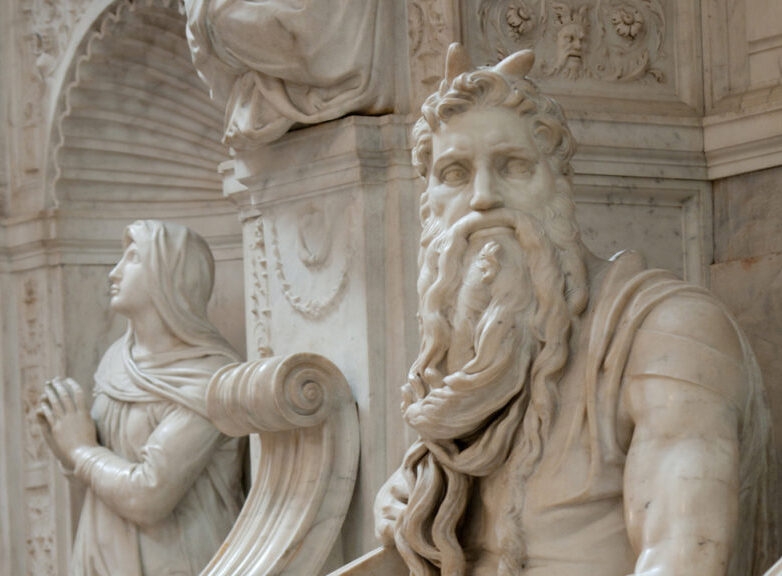 Jacada Travel Rome - a marble statue of a bearded man