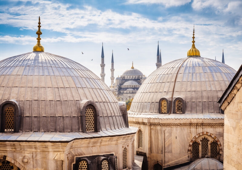 The grey domes and tall minarets of the Blue Mosque in Istanbul seen on luxury Turkey Asia tours.