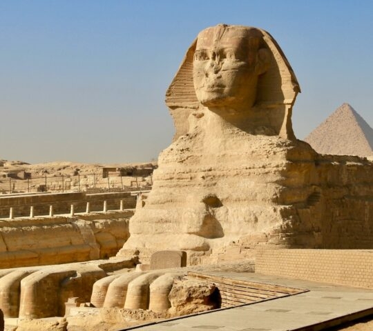 The Great Sphinx of Egypt, a large sand sculpture with the head of a man and the body of a lion