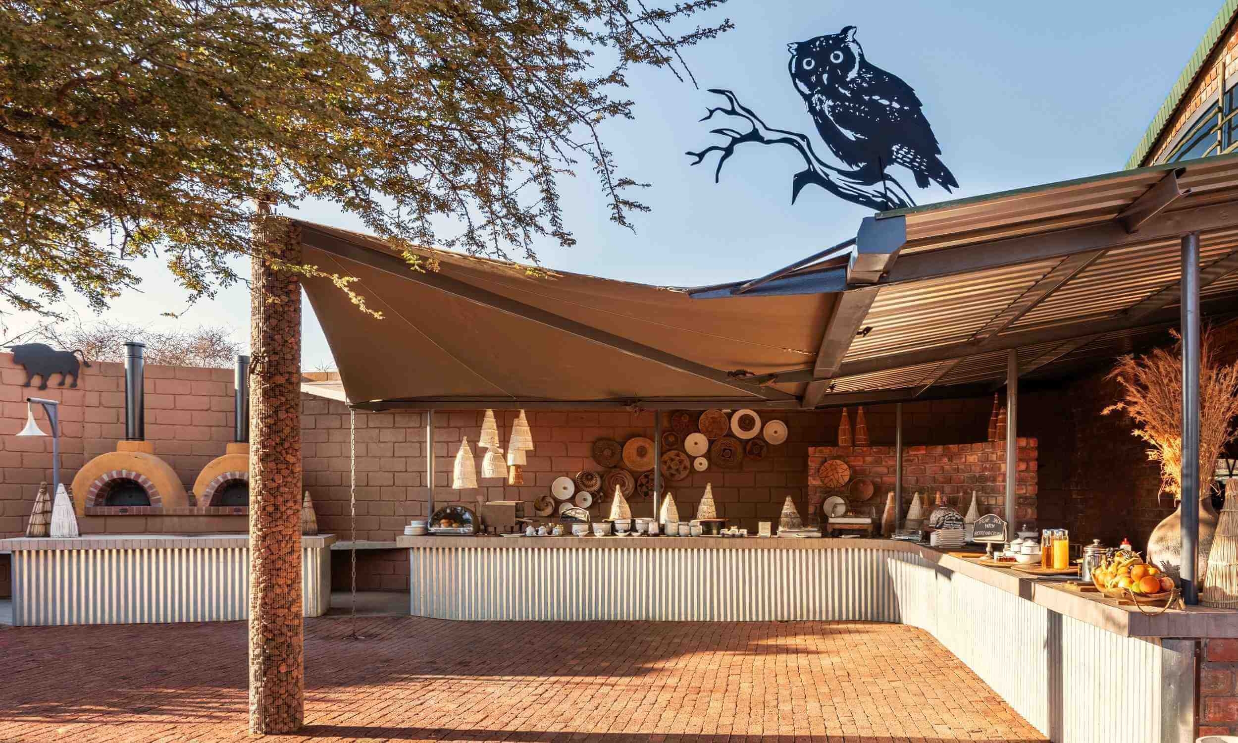 Outdoor breakfast area at Okonjima Plains Camp