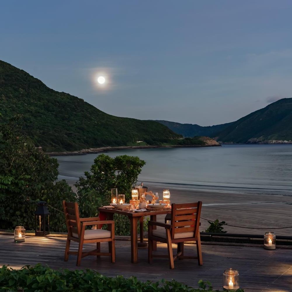 Dining under the stars on the beach at Six Senses Con Dao