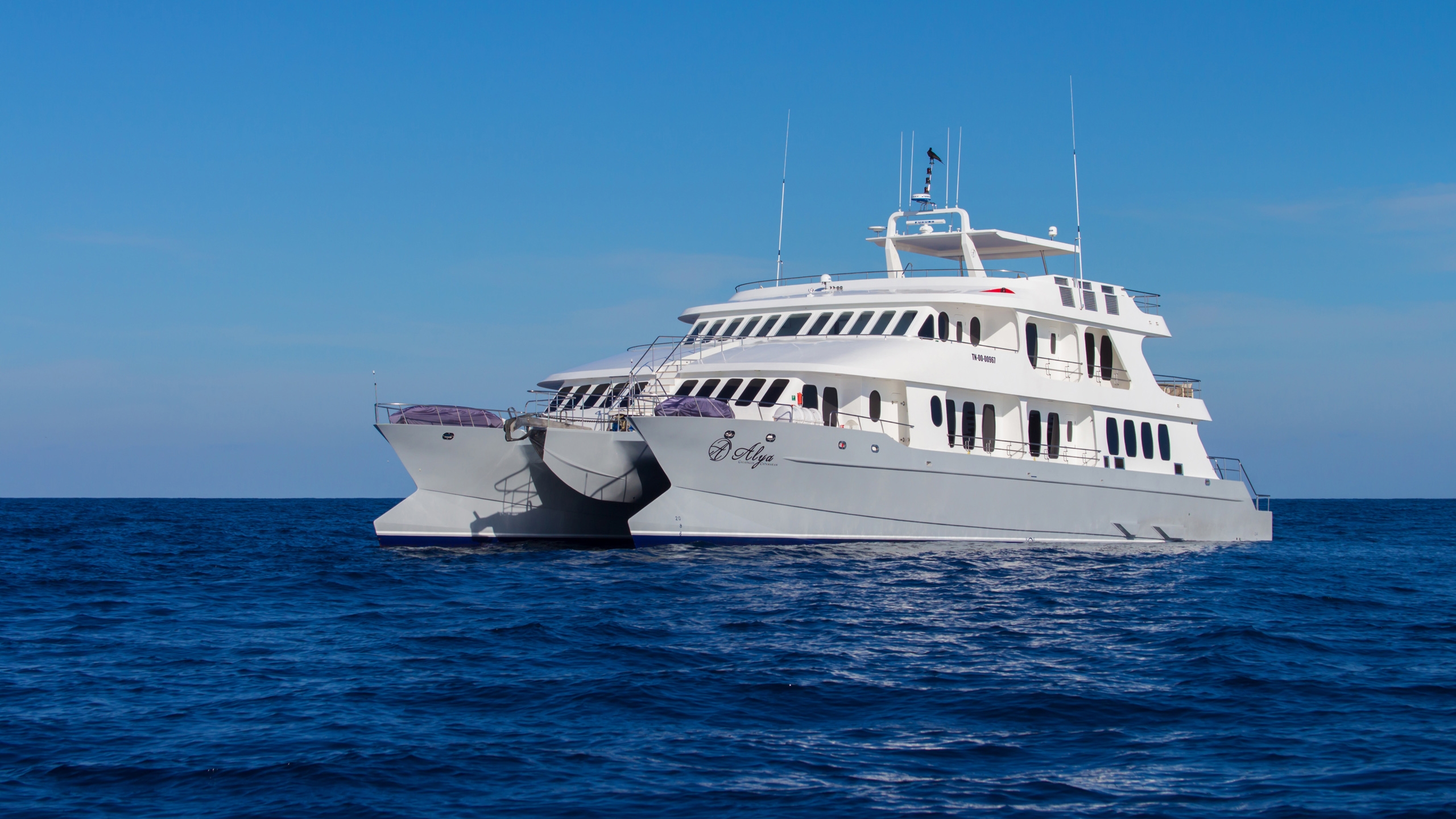 The Alya catamaran moored at sea, the Galapagos Islands, Ecuador