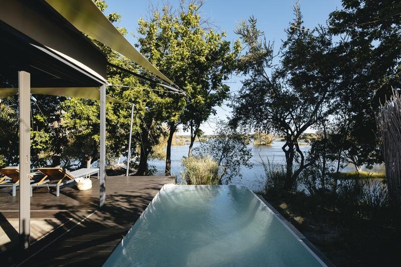 The private plunge pool of a suite at Thorntree River Lodge overlooking the Zambezi.