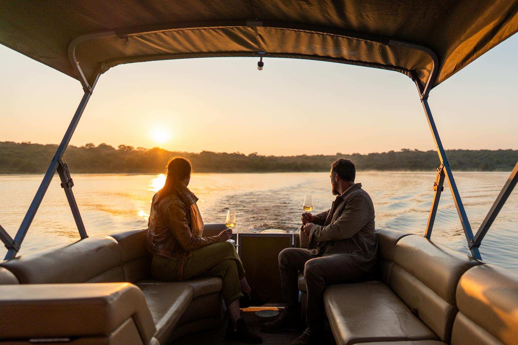 Sunset boat safari at Wilderness Magashi Peninsula, Rwanda