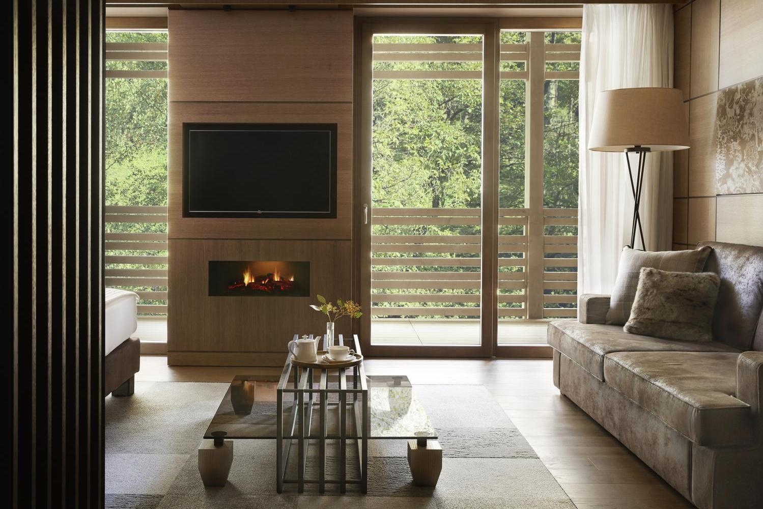 A junior suite bedroom at Lefay Dolomiti
