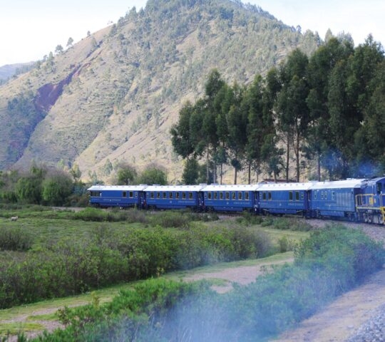 The Hiram Bingham Train winding through the valleys on its journey between the Sacred Valley and Machu Picchu, Peru