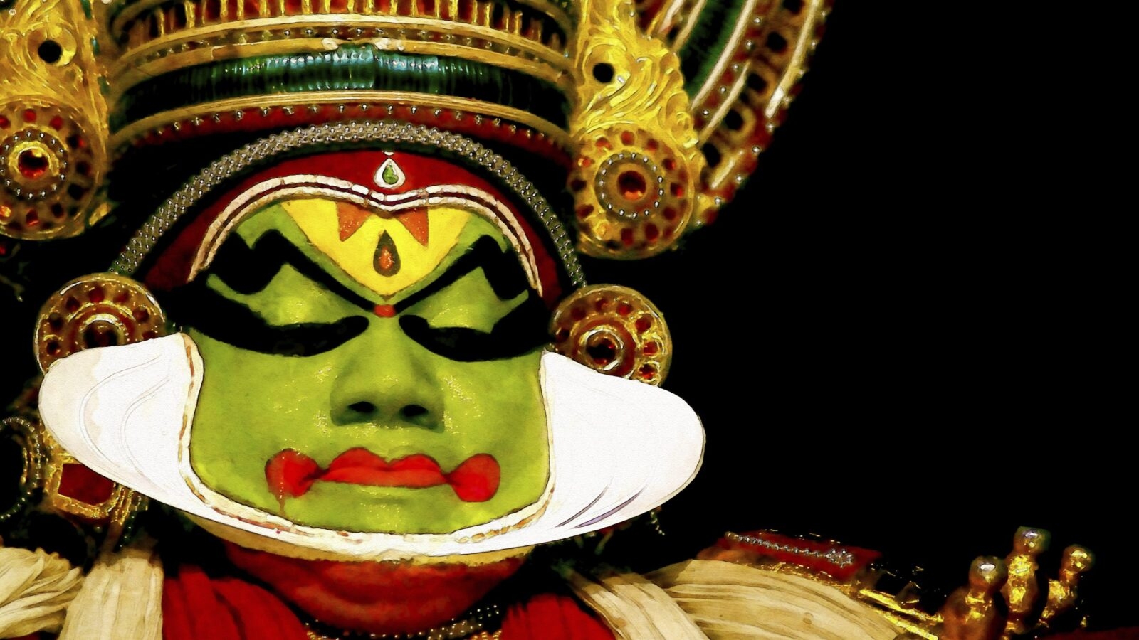 Kathakali dancer in full make up and dress, Fort Cochin, India