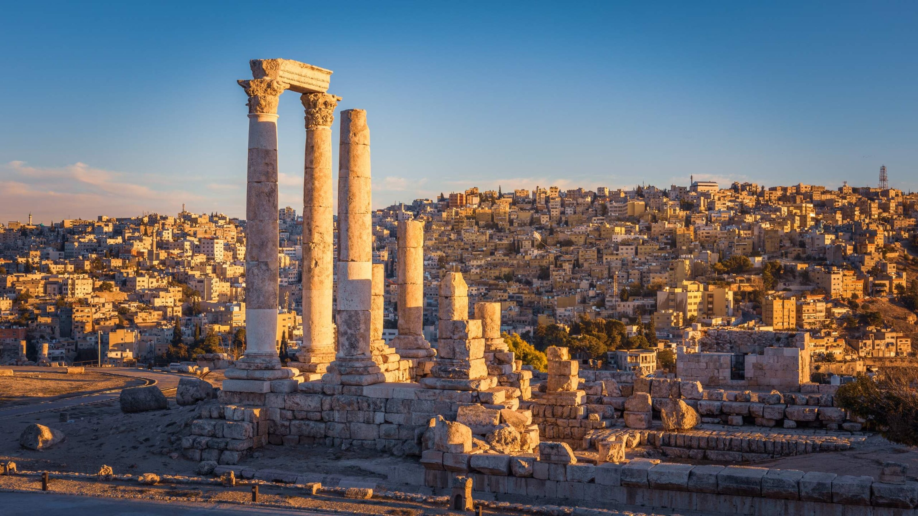 The column remains of the Temple of Hercules overlooking the sand-coloured city of Amman in Jordan