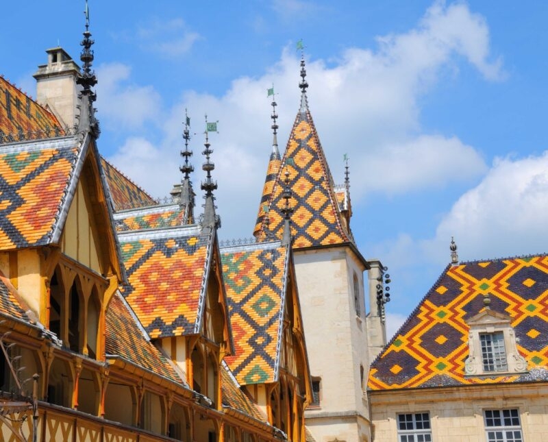 Colourful tiled roofs with geometric patterns