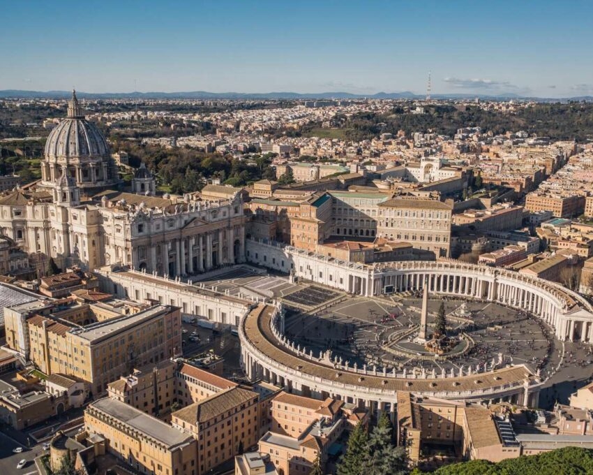 High angle view of St. Peter's Square and the Basilica in Vatican City.