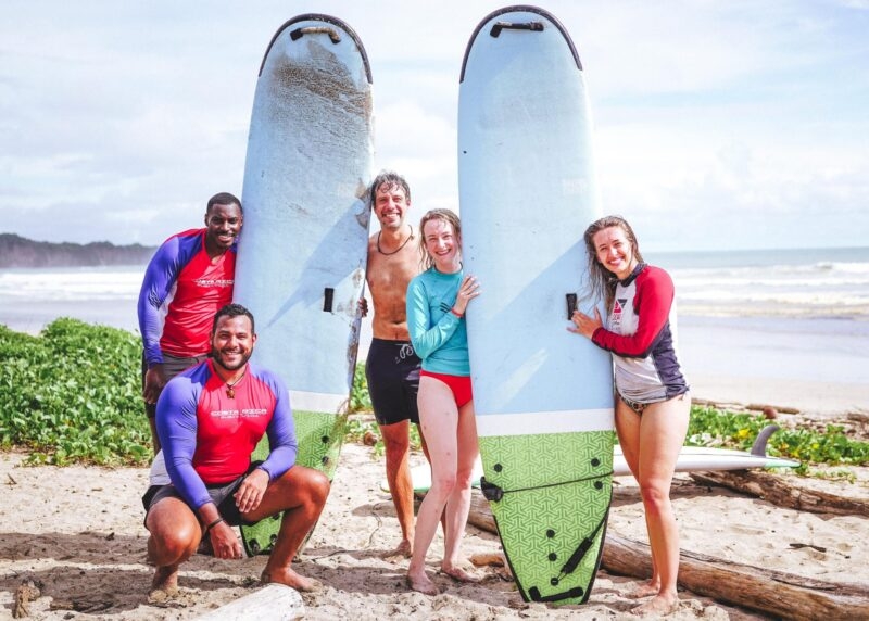 surfers with surfboards