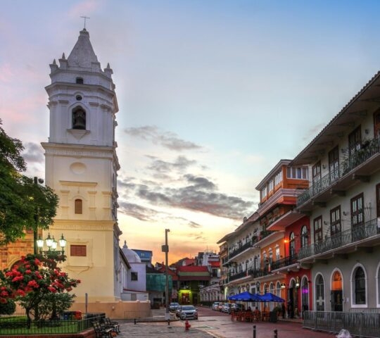 Beautiful sunset in Casco Antiguo Square with old houses and the Panama Metropolitan Cathedral, Santa Maria La Antigua.