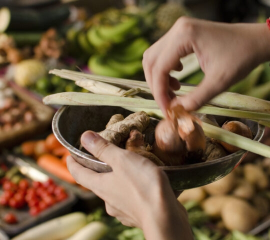 Buying fresh food and vegetables on vietnamese street market