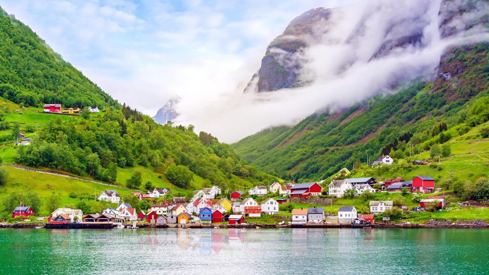 Colourful houses by the edge of a fjord in Norway