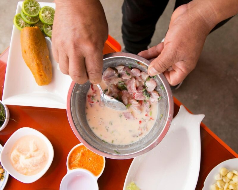 Luxury Peru Tours - A man making ceviche in Peru