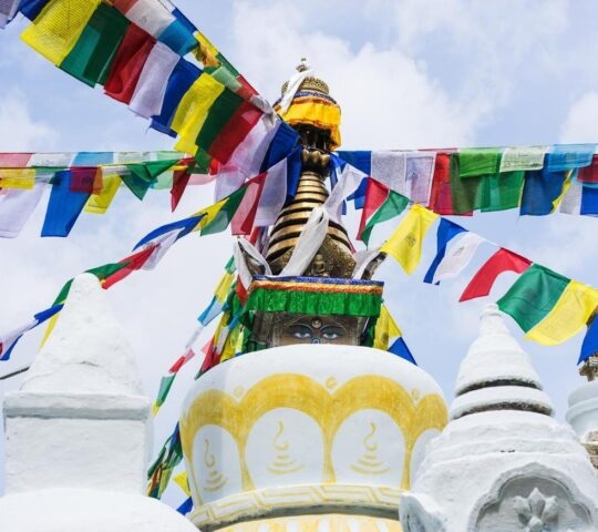 Buddhist prayer flags on a stupa of the Thrangu Tashi Yangtse Monastery complex called Namo Buddha monastery in Nepal.