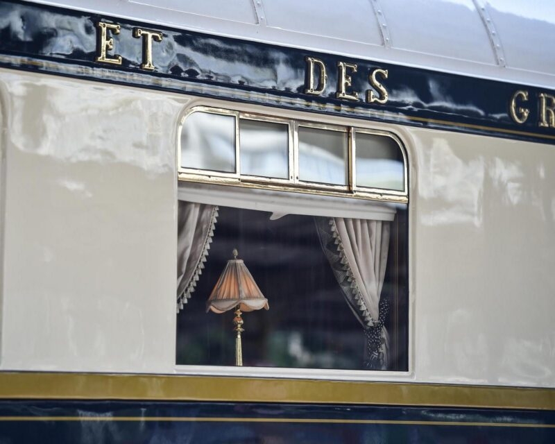 Famous Orient Express long distance passenger train stopped in Bucharest central train station