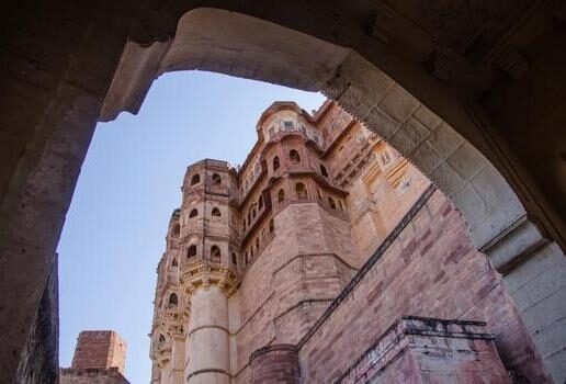 Local women carrying pots with plants at Amber Fort, the intricately detailed facade of Mehrangarh and the sprawling ramparts of Chittorgarh Fort.