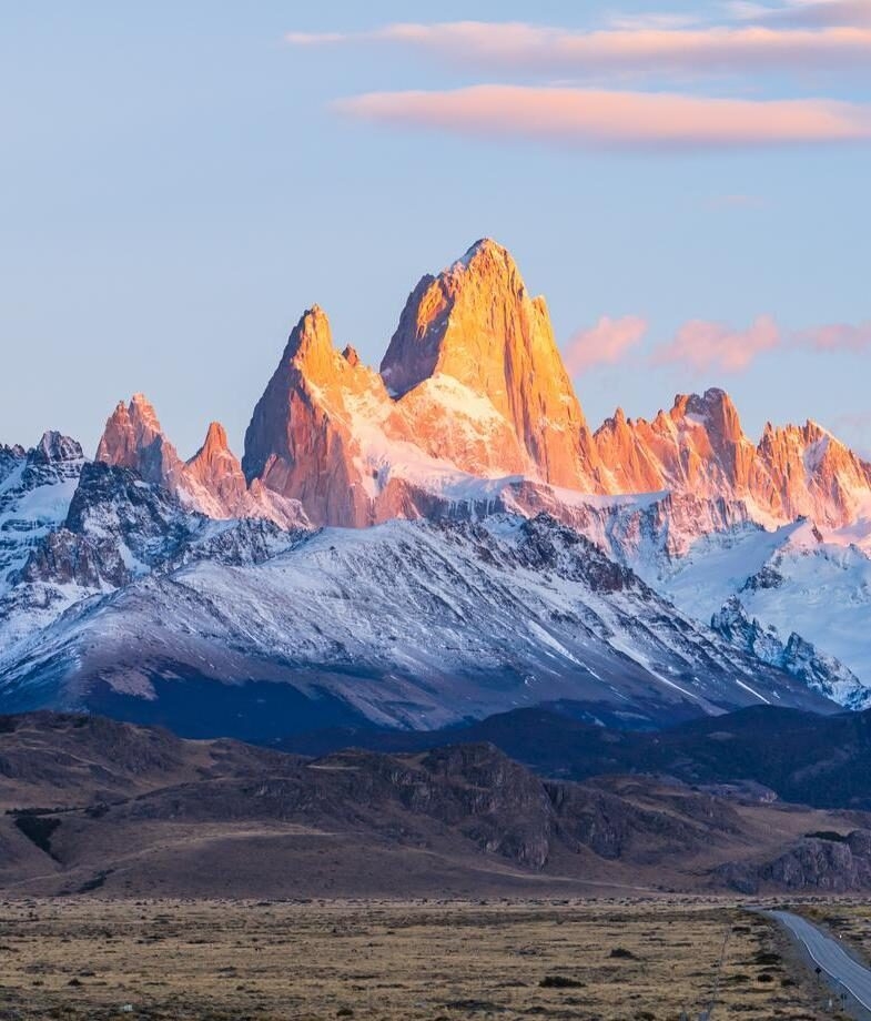 Sunrise over Mount Fitz Roy in Patagonia, and vineyards in Mendoza