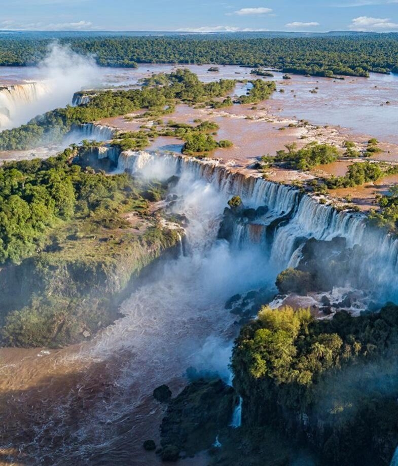 Grapes on the vine in the Serra Gaúcha wine region, and an aerial view of Iguassu Falls