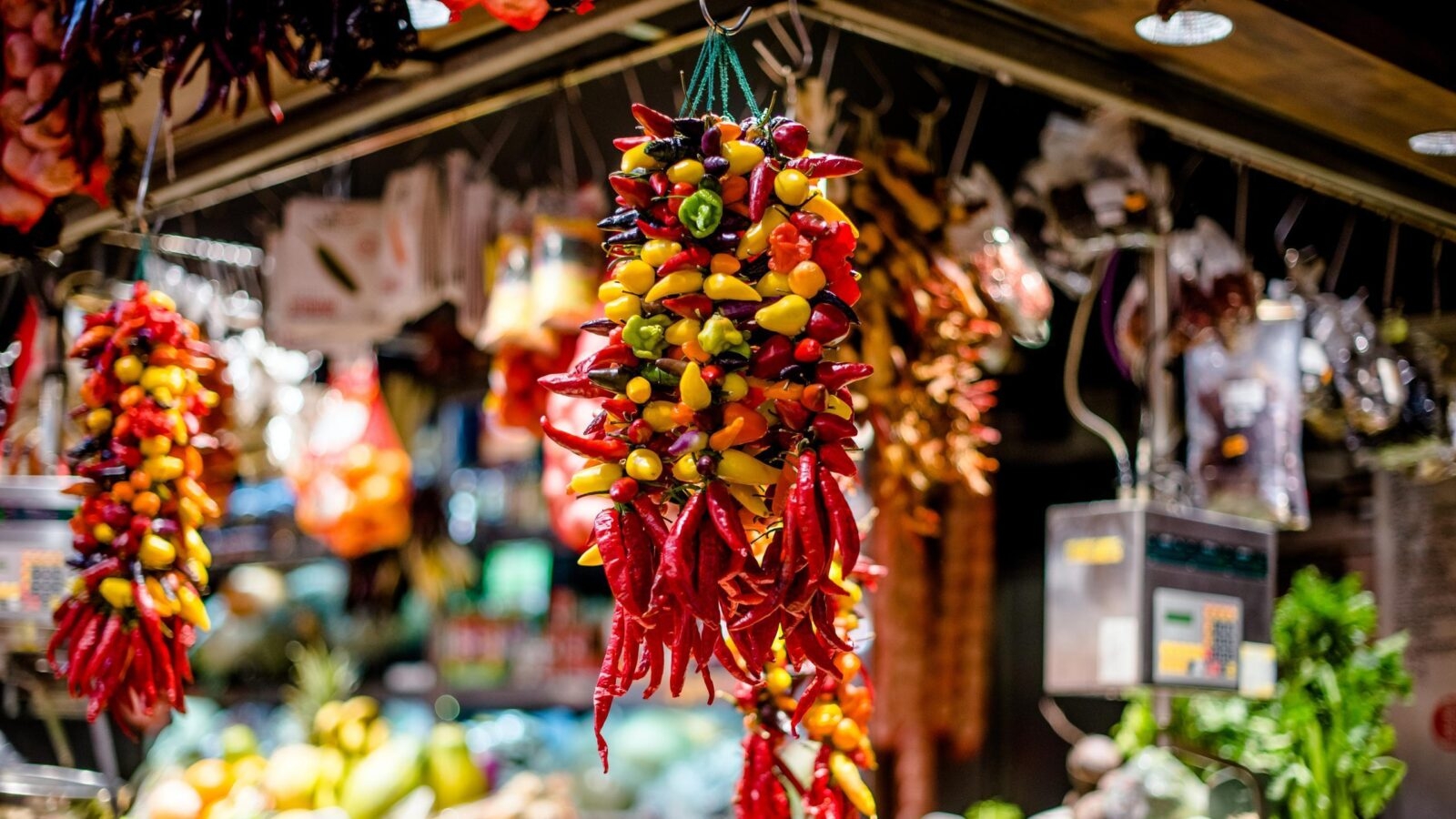 a bunch of hot peppers on the market in Spain