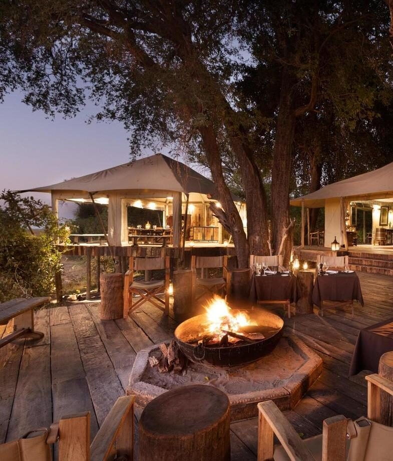 Enjoy cosy campfires and peaceful surroundings at Zarafa and Wilderness DumaTau Camp