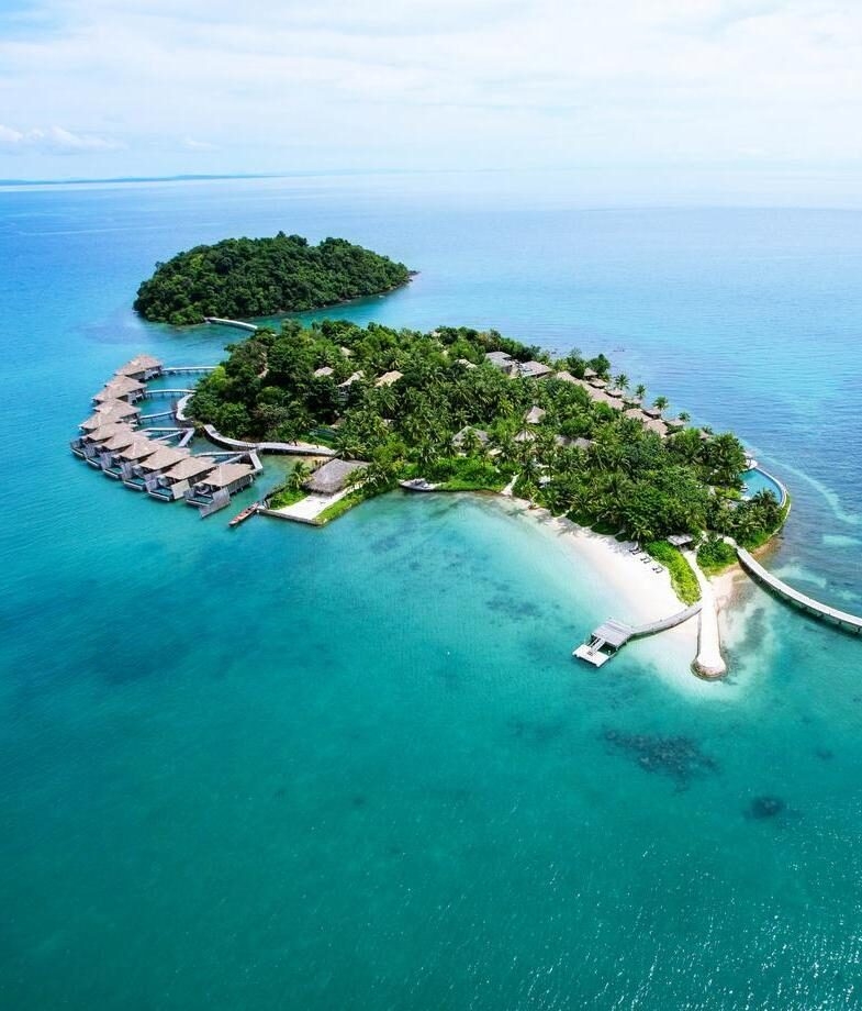 The overwater villas of Song Saa Private Island Resort in Cambodia and the misty green hills of Colombia’s Coffee Triangle.