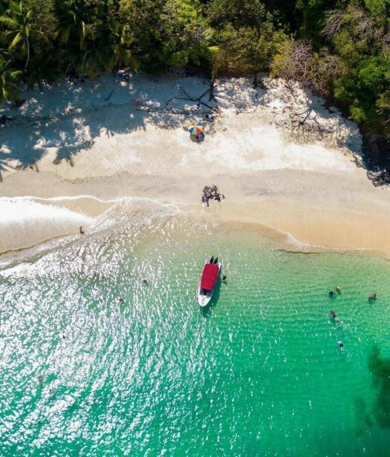 A family enjoys a lovely walk across Costa Rica’s rainforest canopy and, in Panama’s Gulf of Chiriquí, unwind on a beautiful jungle-fringed beach.