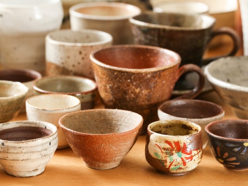 Japanese ceramic cups on a table.