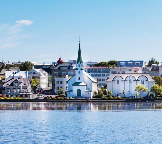 A view of Reykjavik, Iceland's cityscape as seen from the water.