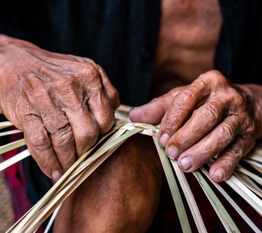 traditional basket weaving in Thailand in a family home
