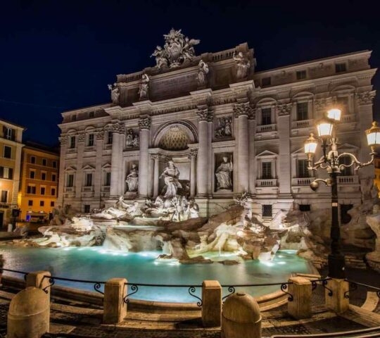 The Trevi Fountain illuminated at night
