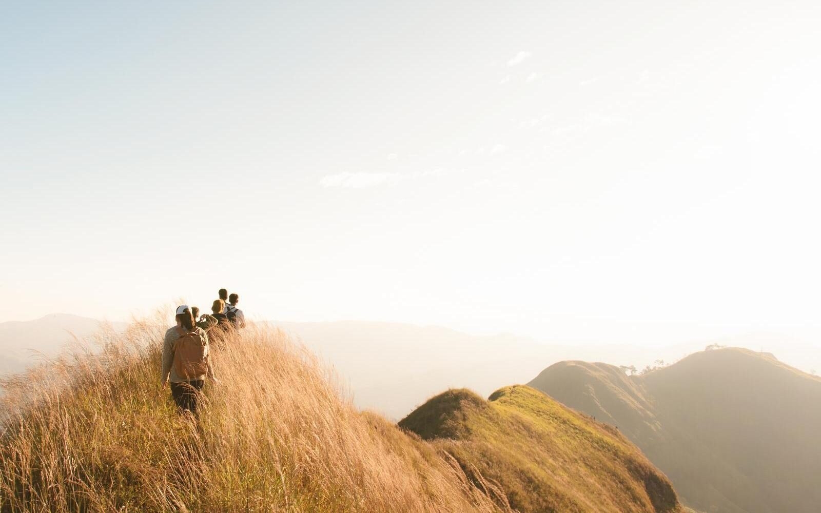 Walking high above the landscape on Khao Chang Phuak Mountain in Kanchanaburi, Thailand.