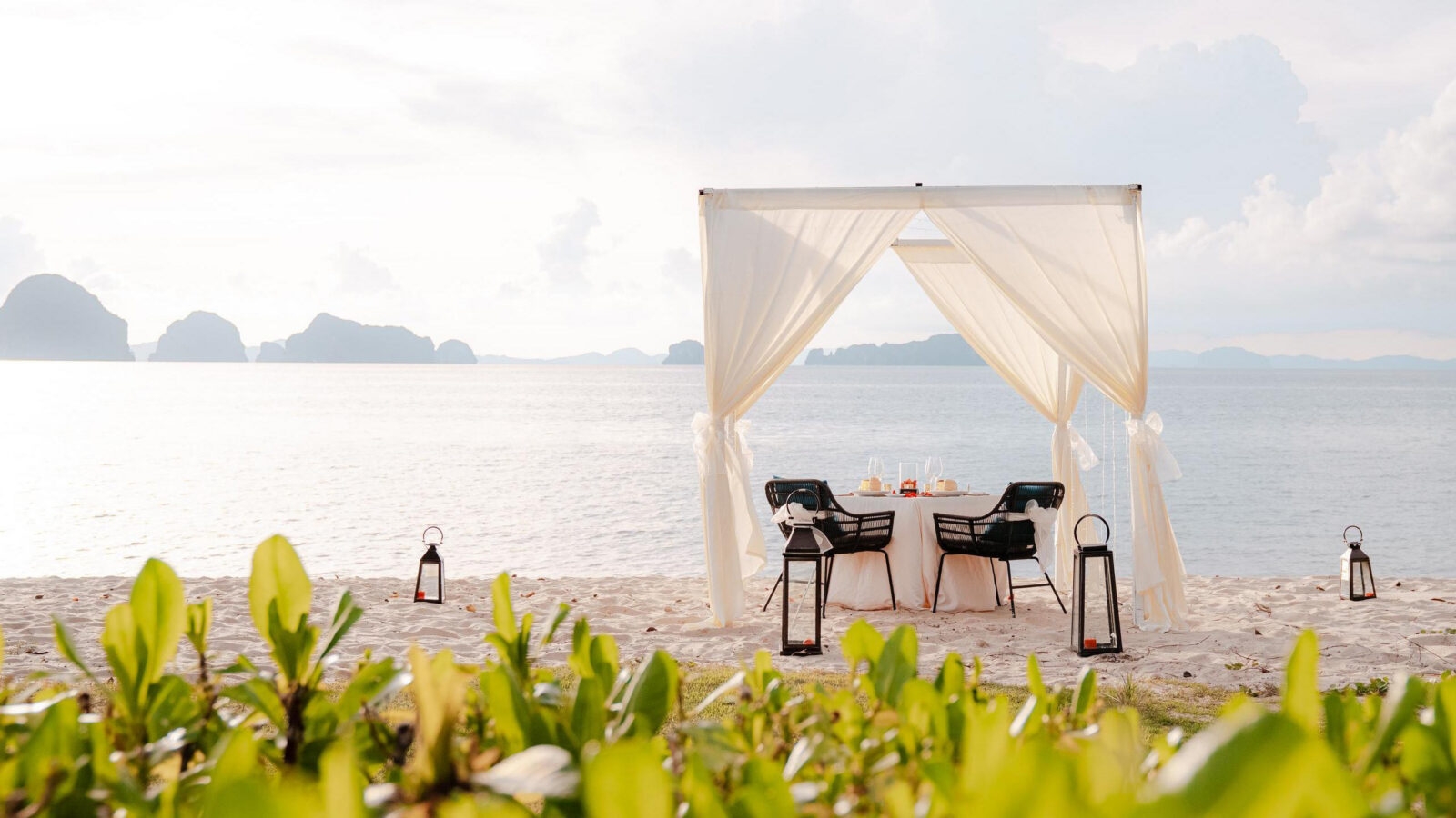 A beautiful private dining set up on a beach in Krabi, Thailand.
