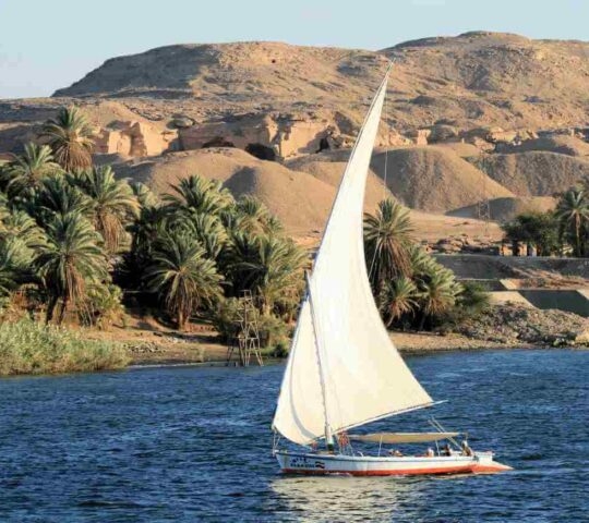A traditional felucca sailboat on the river Nile in Aswan