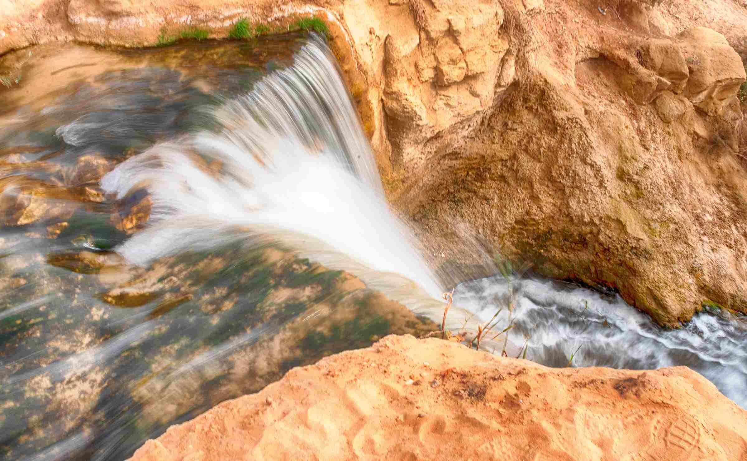 close up view of the mouth of a waterfall at Wadi el Rayan in Egypt